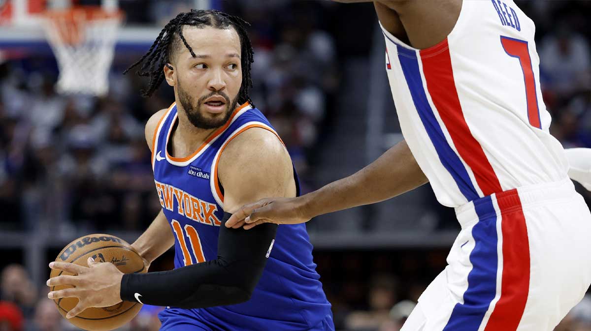 New York Knicks guard Jalen Brunson (11) is defended by Detroit Pistons forward Paul Reed (7) in the first half during game three of first round for the 2024 NBA Playoffs at Little Caesars Arena.