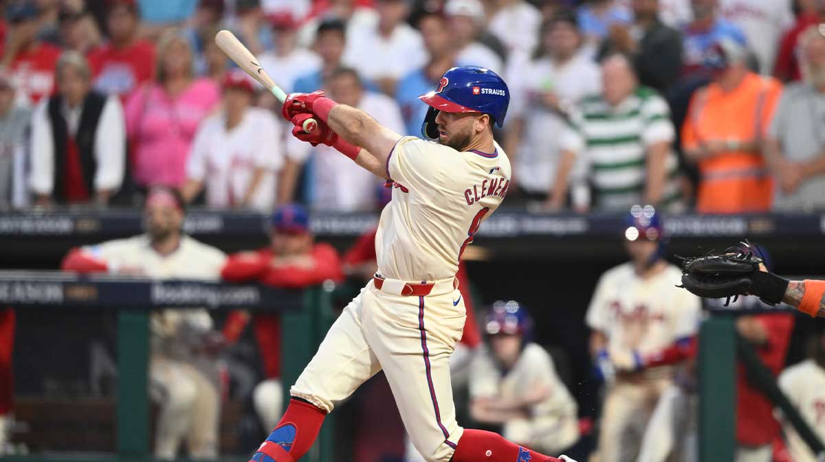Oct 6, 2024; Philadelphia, Pennsylvania, USA; Philadelphia Phillies first base Kody Clemens (2) hits single in the seventh inning against the New York Mets during game two of the NLDS for the 2024 MLB Playoffs at Citizens Bank Park.