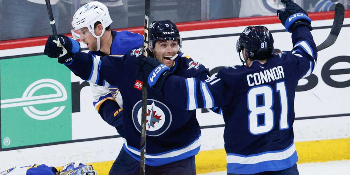 Winnipeg Jets forward Alex Iafallo (9) celebrates his goal against St. Louis Blues goalie Jordan Binnington (50) during the third period in game one of the first round of the 2025 Stanley Cup Playoffs at Canada Life Centre.