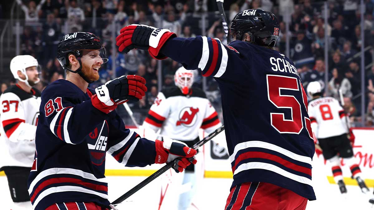 Winnipeg Jets center Mark Scheifele (55) celebrates his goal against the New Jersey Devils with Winnipeg Jets left wing Kyle Connor (81) in the second period at Canada Life Centre.