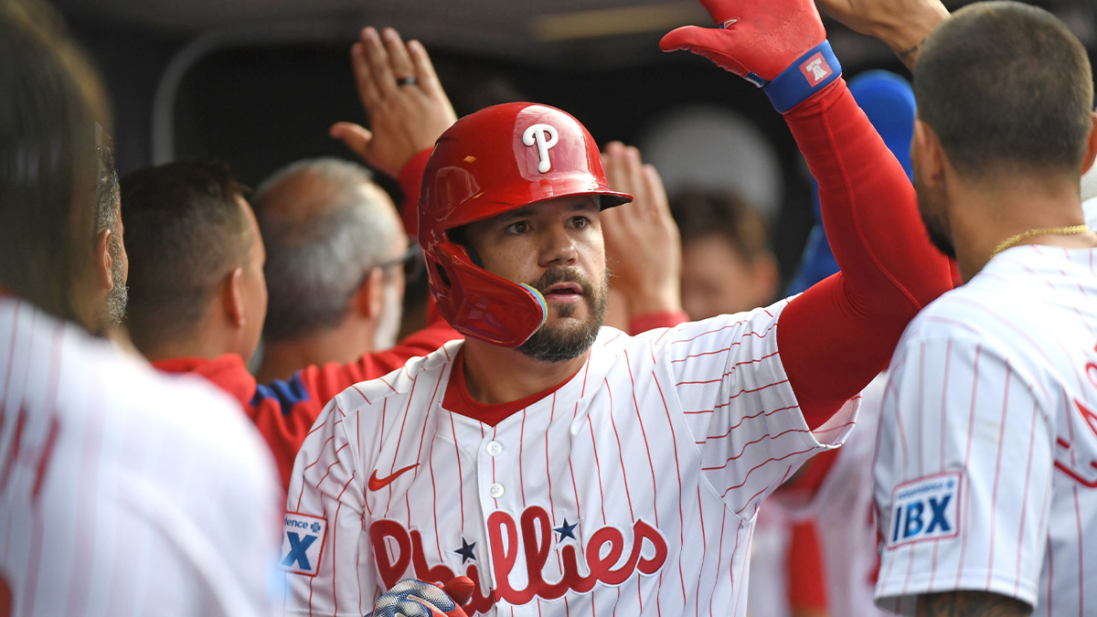 Philadelphia Phillies designated hitter Kyle Schwarber (12) celebrates his two-run home run in the dugout during the seventh inning against the Colorado Rockies at Citizens Bank Park.