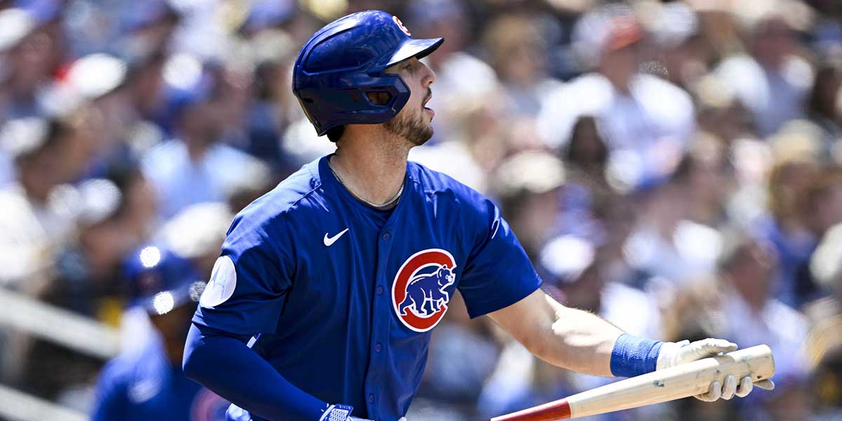 Chicago Cubs right fielder Kyle Tucker (30) hits a sacrifice fly during the third inning against the San Diego Padres at Petco Park.