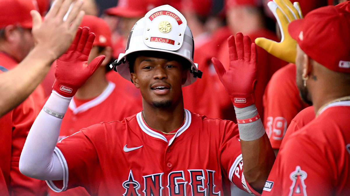 Los Angeles Angels second baseman Kyren Paris (19) celebrates with his teammates after hitting a two run home run in the second inning against the Tampa Bay Rays at George M. Steinbrenner Field.