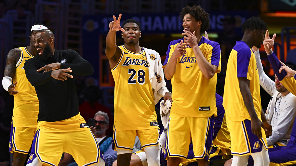 Lakers forward Jarred Vanderbilt (2), forward LeBron James (23), forward Rui Hachimura (28), center Jaxson Hayes (11), and Los Angeles Lakers guard Luka Doncic (77) celebrate after scoring against the Houston Rockets during the second half at Crypto.com Arena