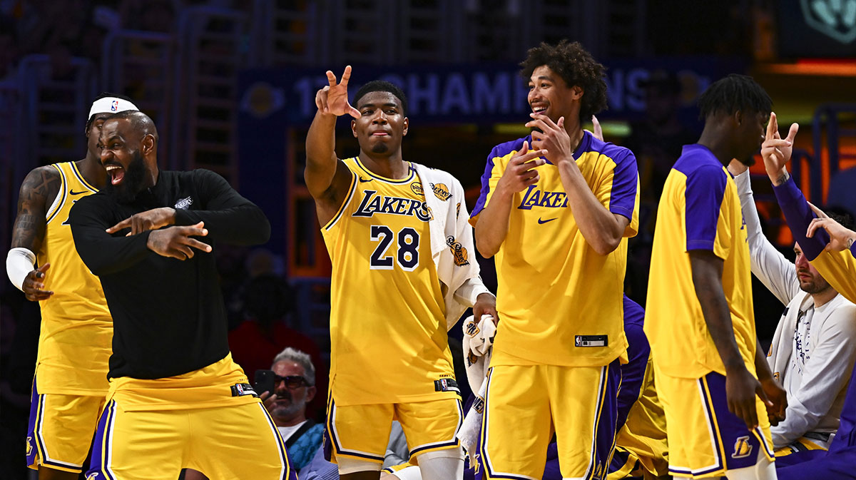 Lakers forward Jarred Vanderbilt (2), forward LeBron James (23), forward Rui Hachimura (28), center Jaxson Hayes (11), and Los Angeles Lakers guard Luka Doncic (77) celebrate after scoring against the Houston Rockets during the second half at Crypto.com Arena