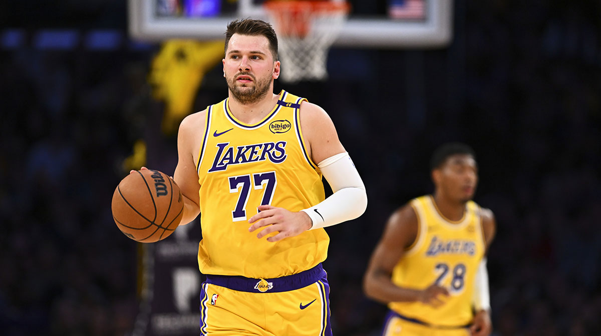 Lakers guard Luka Doncic next to Lebron James and Stephen Curry