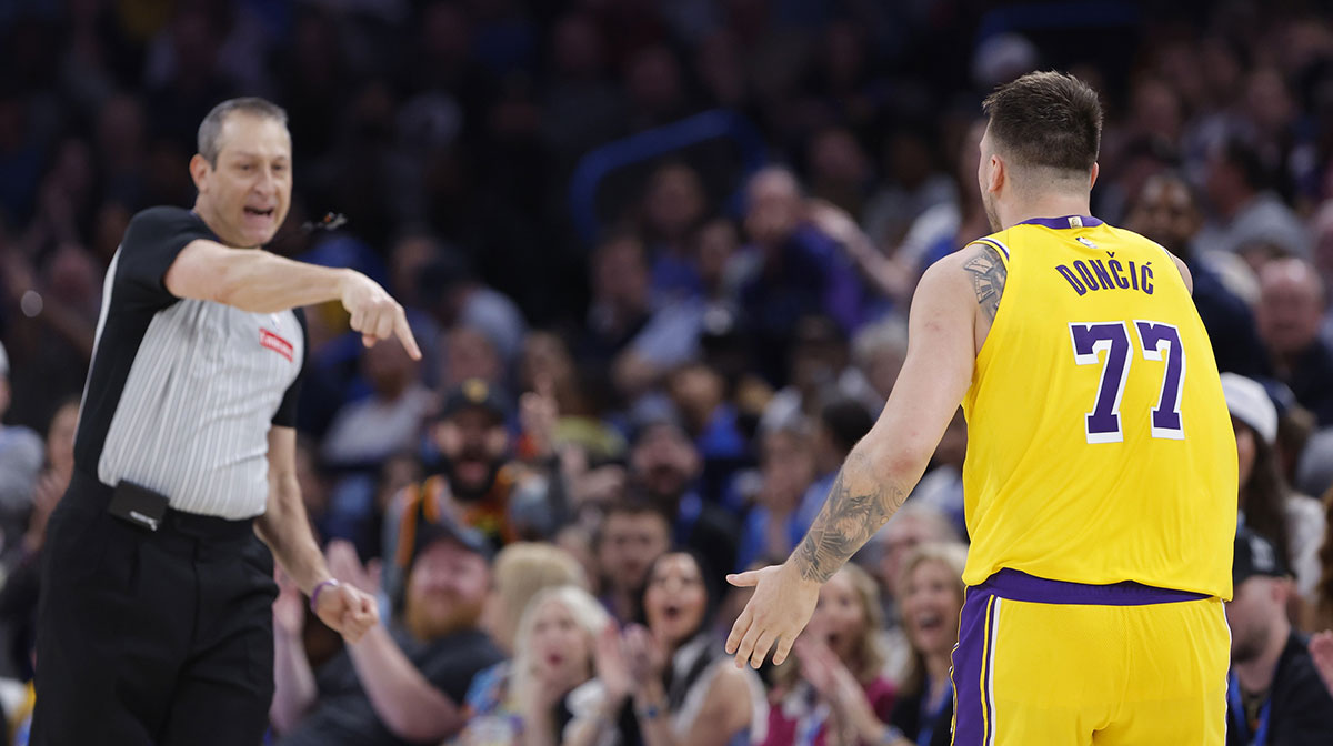 Lakers guard Luka Doncic (77) has a technical call against him during the second half of a game against the Oklahoma City Thunder at Paycom Center