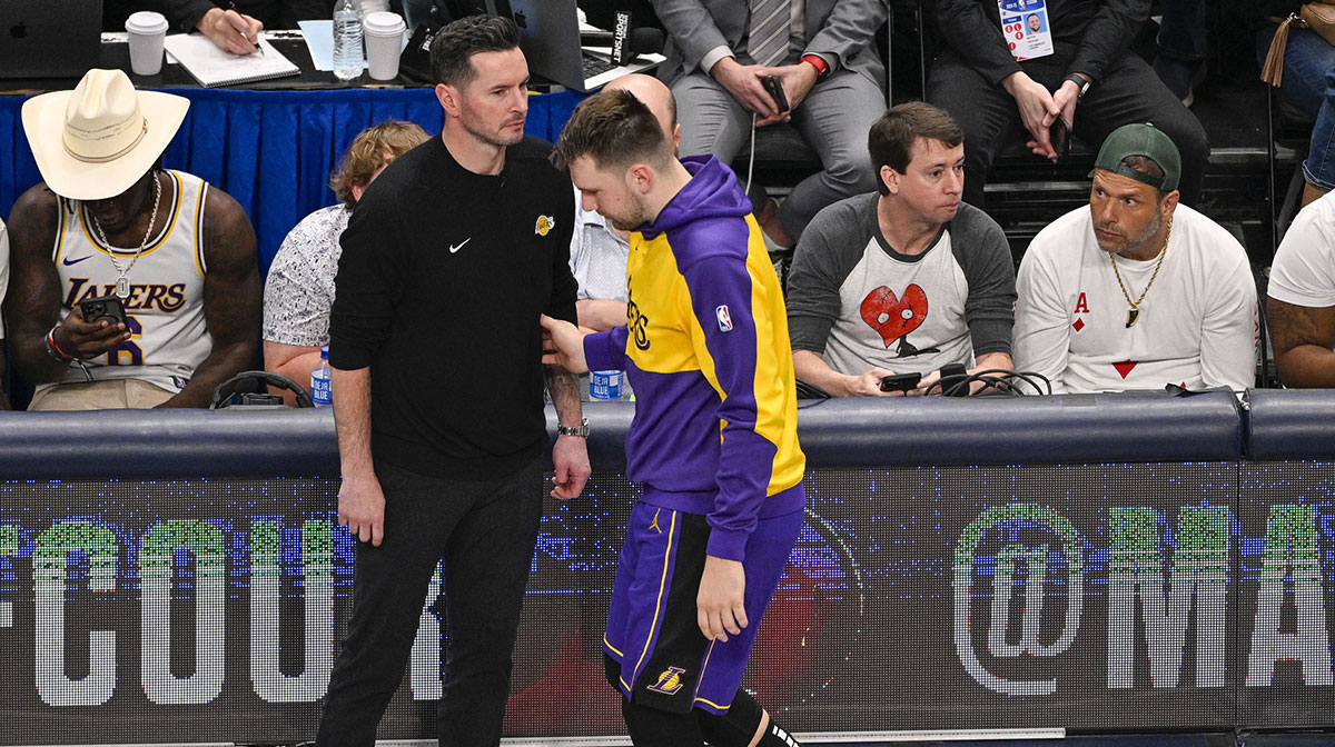 Lakers head coach JJ Redick and guard Luka Doncic (77) during the game between the Dallas Mavericks and the Los Angeles Lakers at American Airlines Center