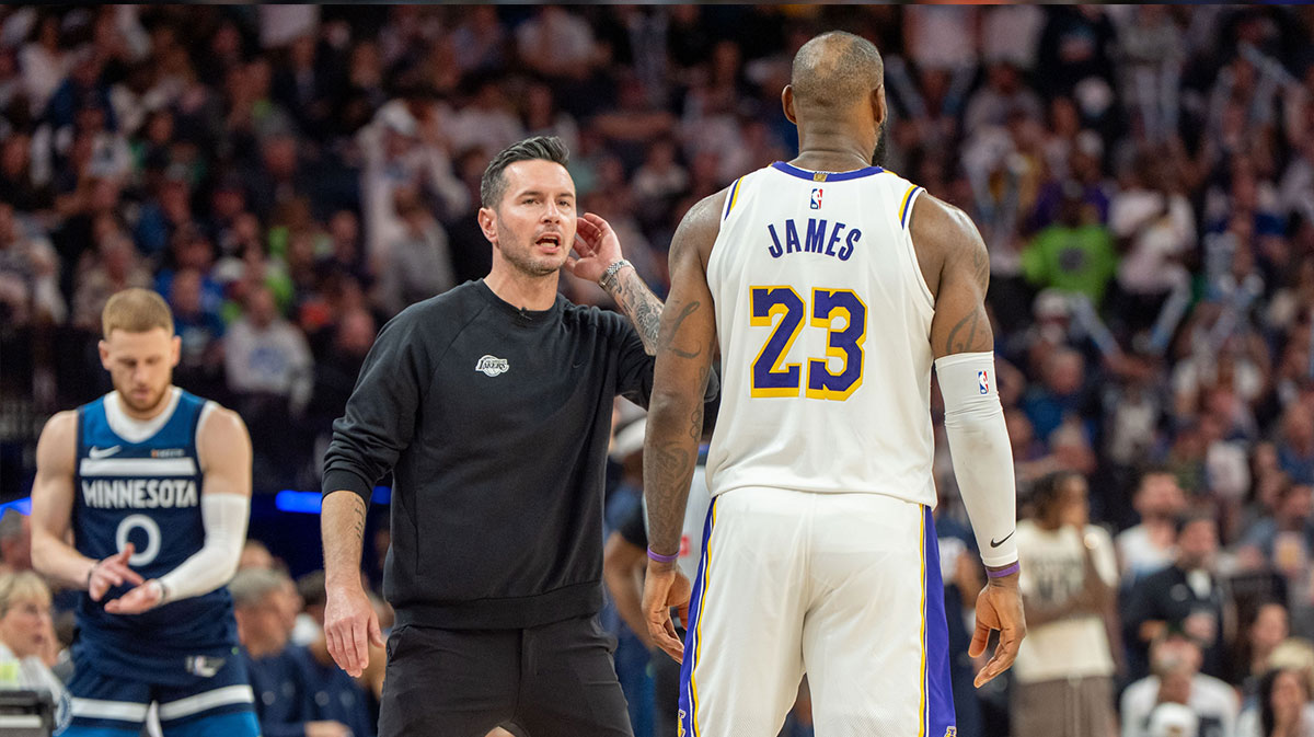 Los Angeles Lakers head coach JJ Redick talks with forward LeBron James (23) in the fourth quarter against the Minnesota Timberwolves during game four of first round for the 2025 NBA Playoffs