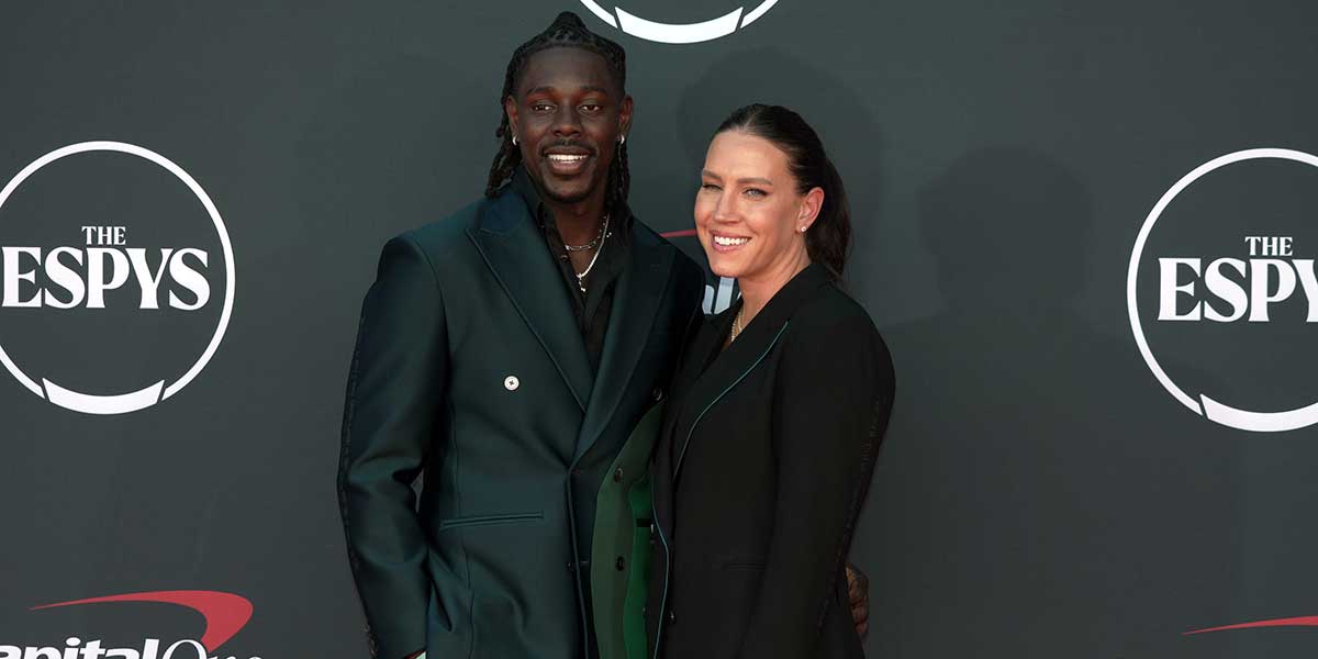 Jrue Holiday and Lauren Holiday arrive on the red carpet before the 2023 ESPYS at the Dolby Theatre.