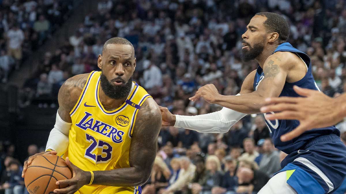 Los Angeles Lakers forward LeBron James (23) drives to the basket past Minnesota Timberwolves guard Mike Conley (10) in the first half during game three of first round for the 2024 NBA Playoffs at Target Center.