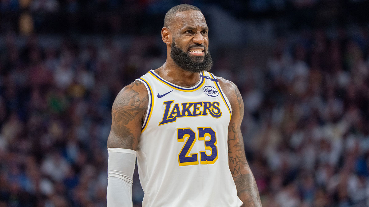 Los Angeles Lakers forward LeBron James (23) talks with a referee in the third quarter against the Minnesota Timberwolves during game four of first round for the 2025 NBA Playoffs at Target Center.