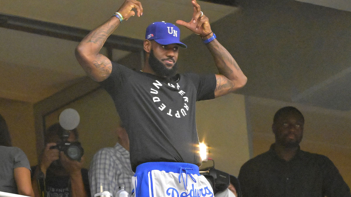 The Los Angeles Lakers LeBron James (23) acknowledges the crowd as he attends the game between the Los Angeles Dodgers and the Miami Marlins on his bobblehead night at Dodger Stadium.
