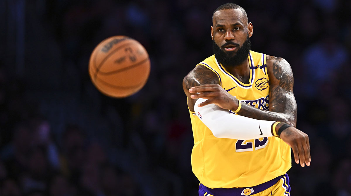 Los Angeles Lakers star LeBron James, who gave a review of Ryan Coogler's new movie Sinners, throwing a pass against the Rockets.
