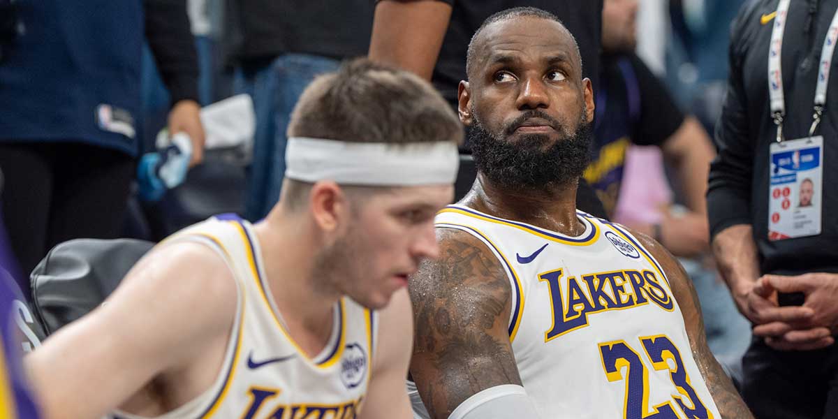Los Angeles Lakers forward LeBron James (23) reacts to a replay that confirms he fouled Minnesota Timberwolves guard Anthony Edwards (5) in the fourth quarter during game four of first round for the 2025 NBA Playoffs at Target Center.