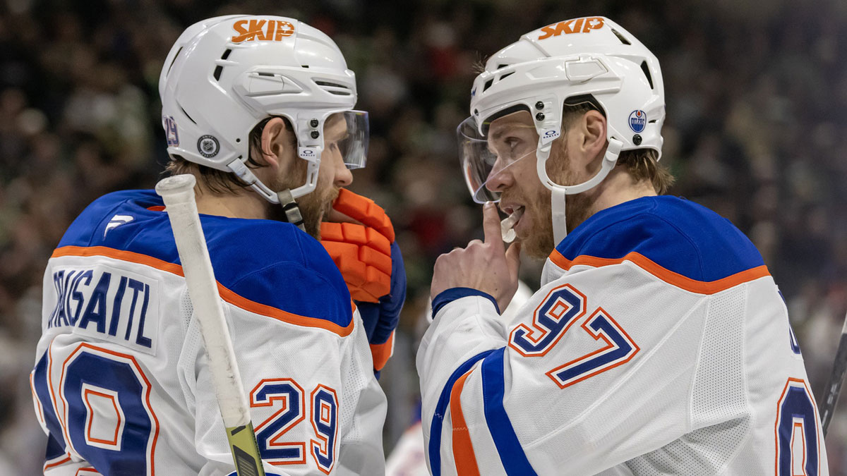 Edmonton Oilers forward Leon Draisaitl (29) and forward Connor McDavid (97) talk before a face-off against the Minnesota Wild during the third period at Xcel Energy Center.