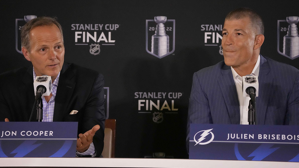 Tampa Bay Lightning head coach Jon Cooper and general manager Julien Brisebois speaks during media day for the 2022 Stanley Cup Final at Ball Arena.