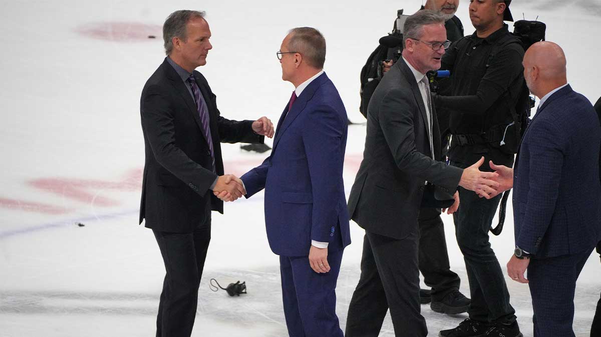 Tampa Bay Lightning head coach Jon Cooper, left, congratulates Florida Panthers head coach Paul Maurice following game five of the first round of the 2024 Stanley Cup Playoffs at Amerant Bank Arena. The Panthers won the series 4-1 and advance to the second round.