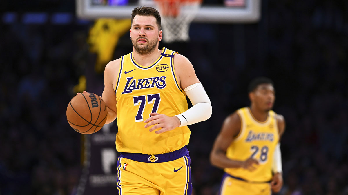 Los Angeles Lakers guard Luka Doncic (77) moves the ball against the Houston Rockets during the first half at Crypto.com Arena