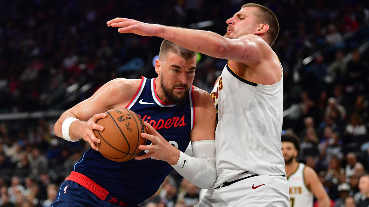 Los Angeles Clippers center Ivica Zubac (40) moves to the basket against Denver Nuggets center Nikola Jokic (15) during the second half of game three in the first round for the 2024 NBA Playoffs at Intuit Dome.