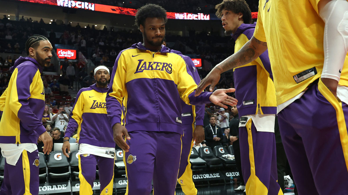 Apr 13, 2025; Portland, Oregon, USA; Los Angeles Lakers guard Bronny James (9) enters the line up before playing in a game against the Portland Trail Blazers at Moda Center. Mandatory Credit: Jaime Valdez-Imagn Images