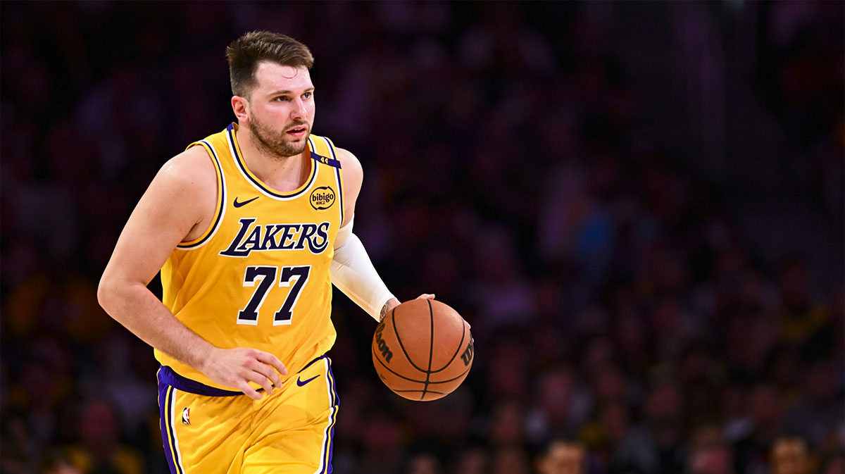 Los Angeles Lakers guard Luka Doncic (77) moves the ball against the Houston Rockets during the first half at Crypto.com Arena.
