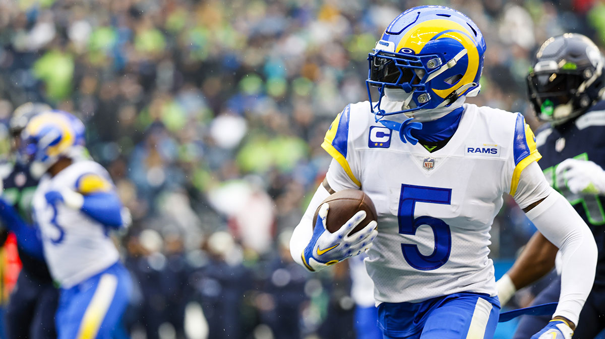 Los Angeles Rams cornerback Jalen Ramsey (5) returns an interception against the Seattle Seahawks during the first quarter at Lumen Field.
