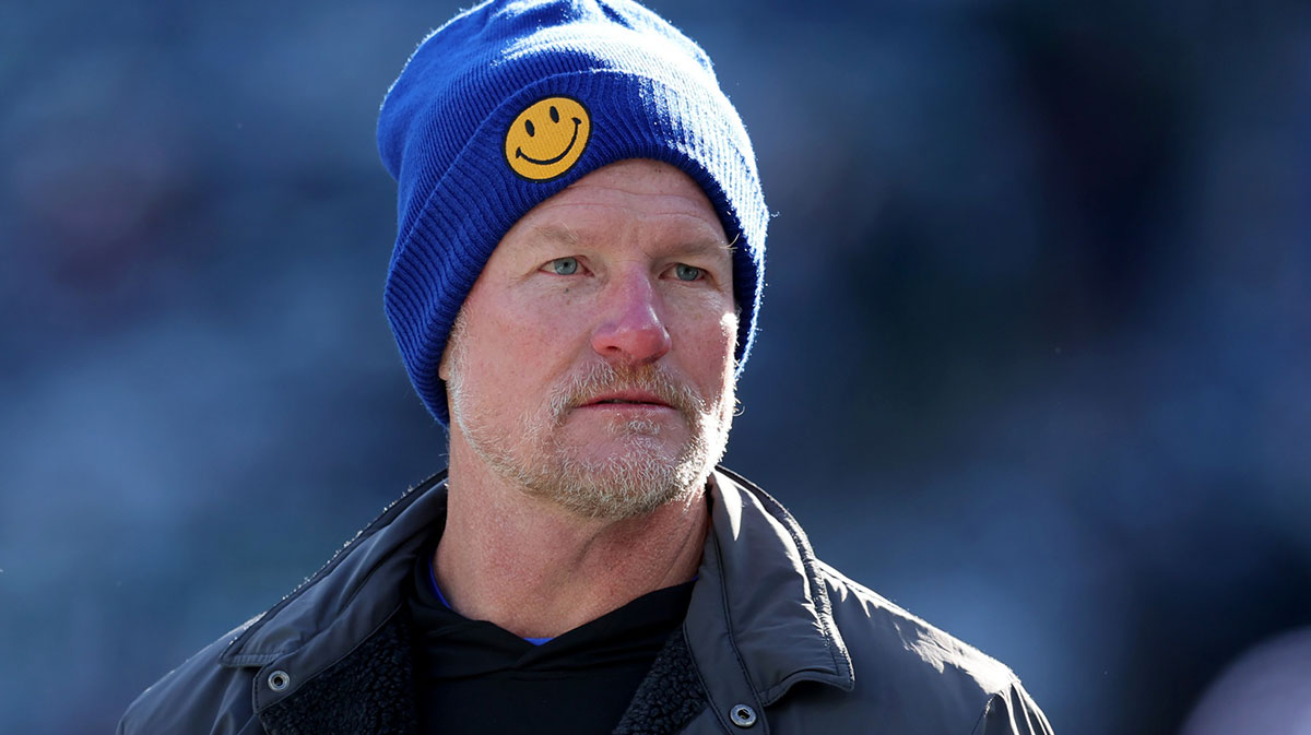 Los Angeles Rams general manager Les Snead watches his team warm up before a game against the New York Jets