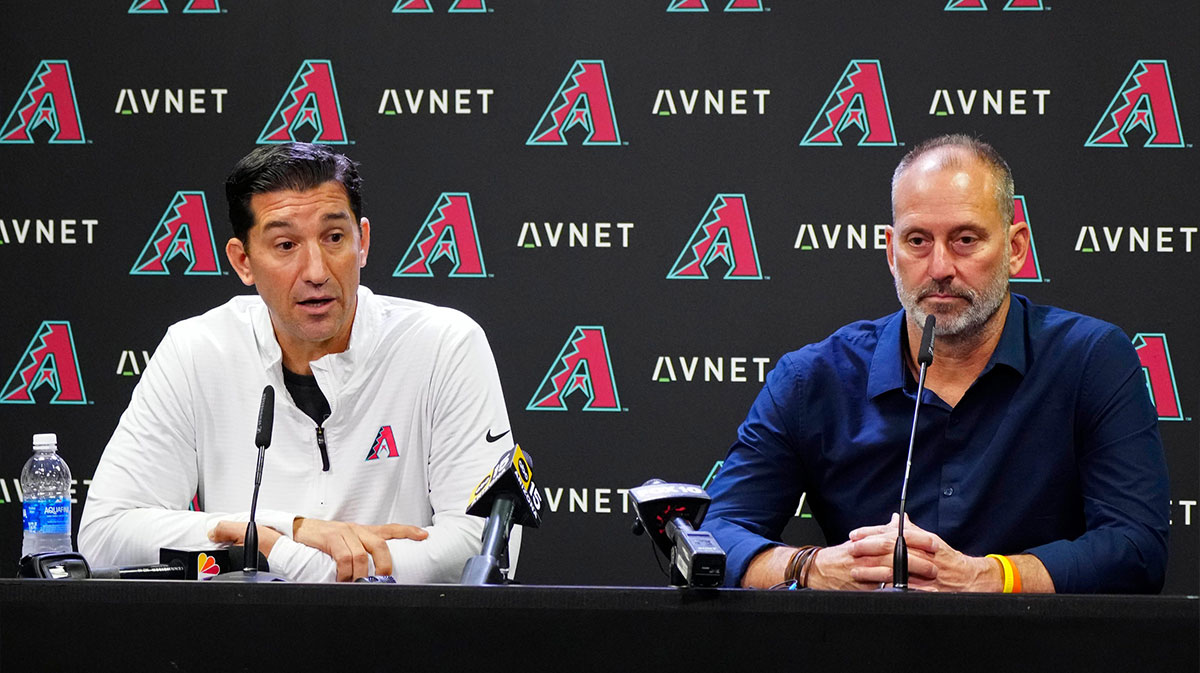 Diamondbacks GM Mike Hazen (left) speaks to the media with Diamondbacks head coach Torey Lovullo after the team was eliminated from playoff contention at Chase Field in Phoenix on Oct. 1, 2024. Patrick Breen/The Republic / USA TODAY NETWORK via Imagn Images