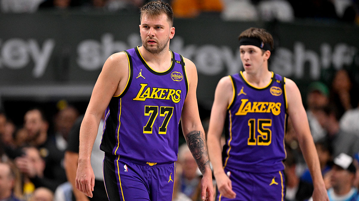 Los Angeles Lakers guard Luka Doncic (77) and guard Austin Reaves (15) during the game between the Dallas Mavericks and the Los Angeles Lakers at American Airlines Center.