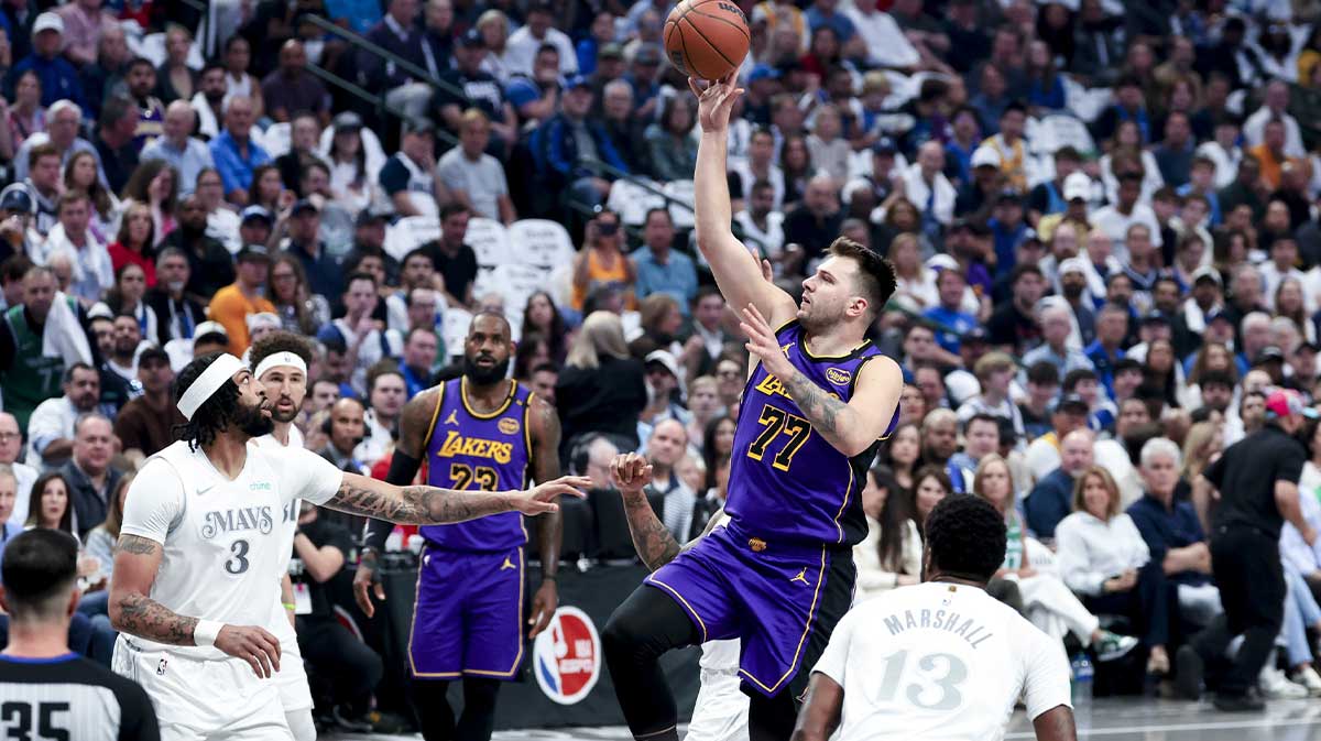 Los Angeles Lakers guard Luka Doncic (77) shoots during the first quarter against the Dallas Mavericks at American Airlines Center.