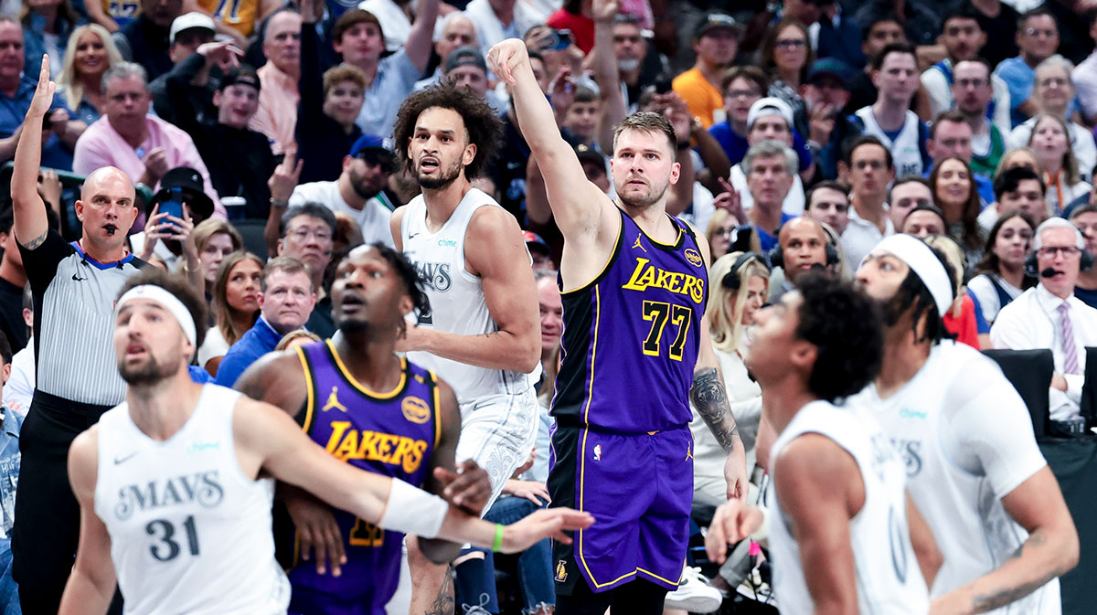 Los Angeles Lakers guard Luka Doncic (77) reacts after scoring against the Dallas Mavericks during the second quarter at American Airlines Center.