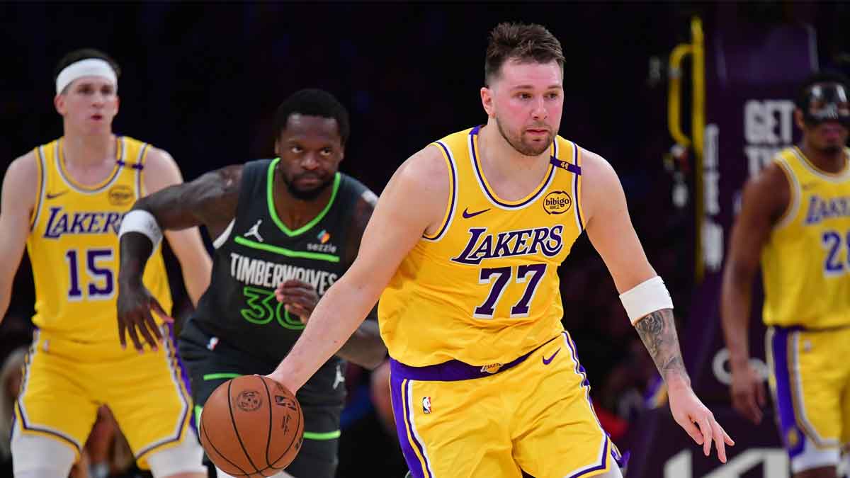 Los Angeles Lakers guard Luka Doncic (77) moves the ball up court against the Minnesota Timberwolves during the first half in game five of first round for the 2025 NBA Playoffs at Crypto.com Arena.