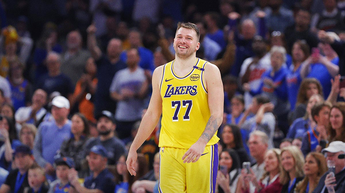 Los Angeles Lakers guard Luka Doncic (77) smiles after a technical is called against him during the second half of a game against the Oklahoma City Thunder at Paycom Center.