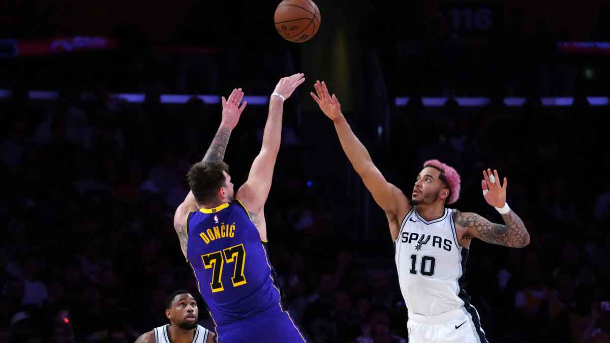 Los Angeles Lakers guard Luka Doncic (77) shoots the ball against San Antonio Spurs forward Jeremy Sochan (10) in the first half at Crypto.com Arena.