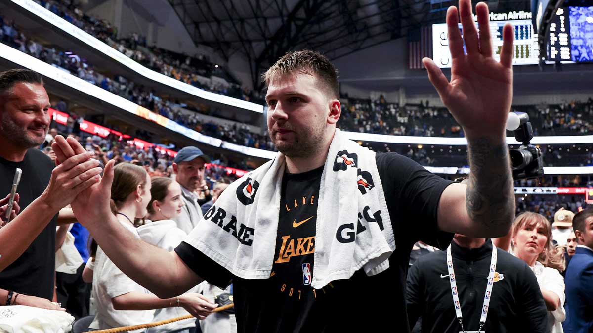 Los Angeles Lakers guard Luka Doncic (77) waves to fans after the game against the Dallas Mavericks at American Airlines Center.