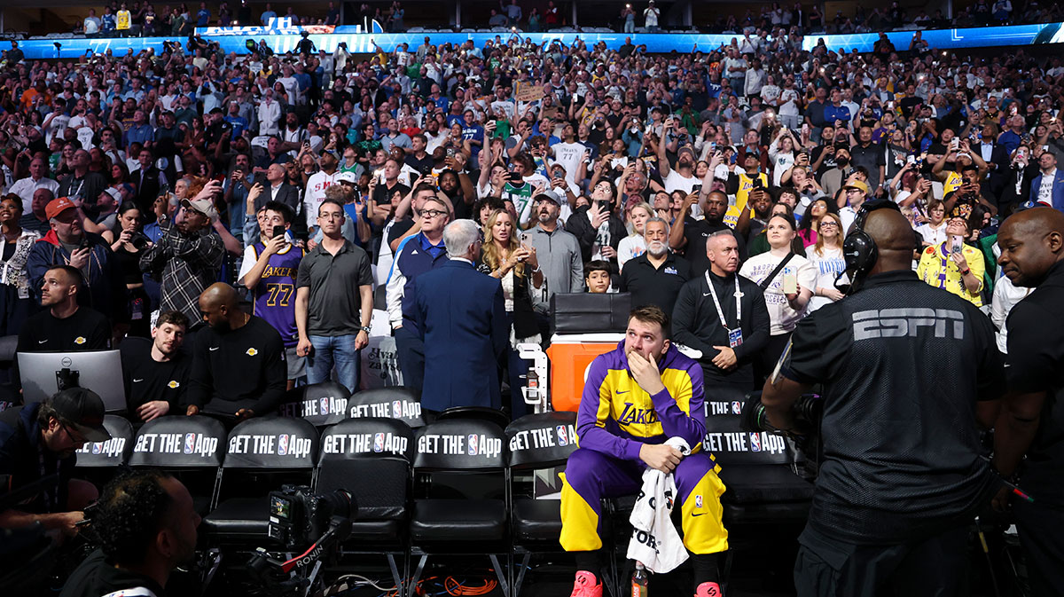 Los Angeles Lakers guard Luka Doncic (77) reacts while watching a tribute video before the game against the Dallas Mavericks at American Airlines Center.