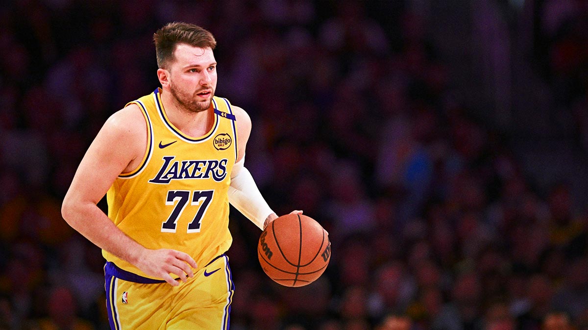 Los Angeles Lakers guard Luka Doncic (77) moves the ball against the Houston Rockets during the first half at Crypto.com Arena.