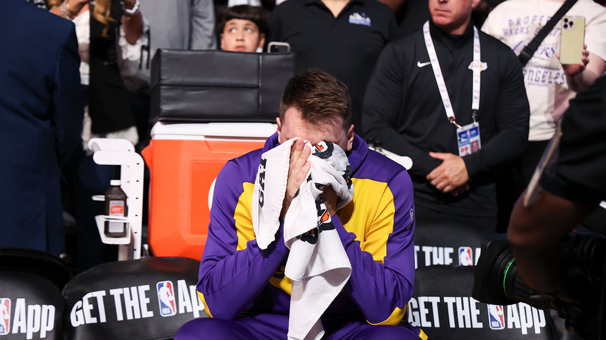 Los Angeles Lakers guard Luka Doncic (77) reacts while watching a tribute video before the game against the Dallas Mavericks at American Airlines Center.