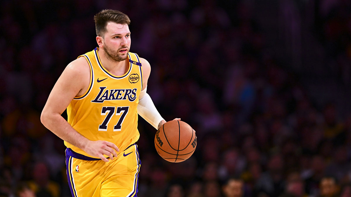 Los Angeles Lakers guard Luka Doncic (77) moves the ball against the Houston Rockets during the first half at Crypto.com Arena.