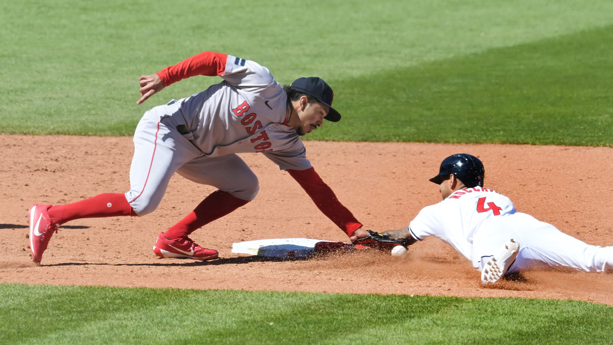 Cleveland Guardians shortstop Brayan Rocchio (4) steals second as Boston Red Sox shortstop Ceddanne Rafaela (43) drops the ball during the sixth inning at Progressive Field.