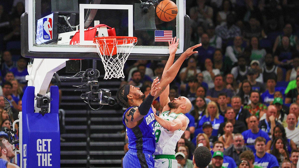 Boston Celtics guard Derrick White (9) shoots against Orlando Magic center Wendell Carter Jr. (34) during the second quarter of game three of first round for the 2024 NBA Playoffs at Kia Center.