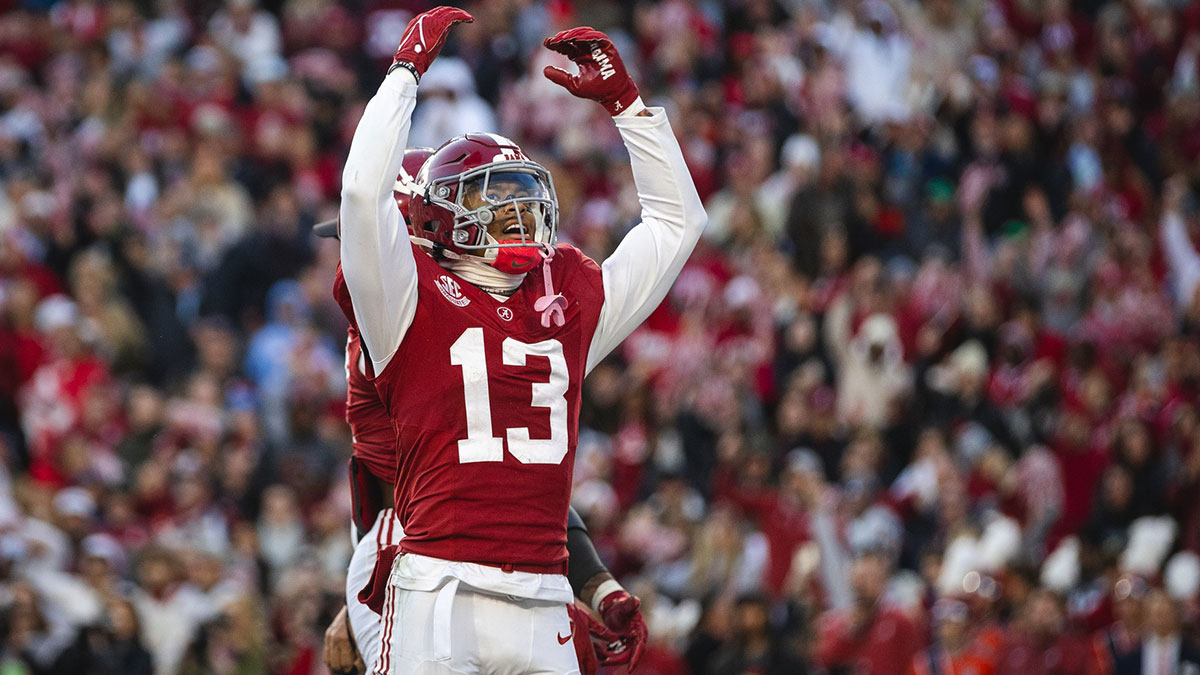 Alabama Crimson Tide defensive back Malachi Moore (13) celebrates after a play against John Schneider and the Auburn Tigers during the second quarter at Bryant-Denny Stadium.