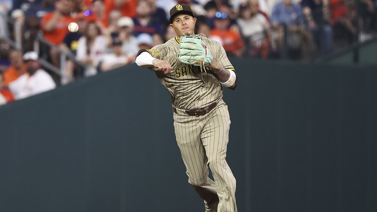 San Diego Padres third baseman Manny Machado (13) throws to first base on a play during the fifth inning against the Houston Astros at Daikin Park