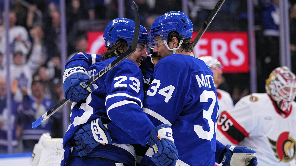 Toronto Maple Leafs forward Auston Matthews (34) congratulates forward Matthew Knies (23) on his goal against the Ottawa Senators during the third period of game one of the first round of the 2025 Stanley Cup Playoffs at Scotiabank Arena.