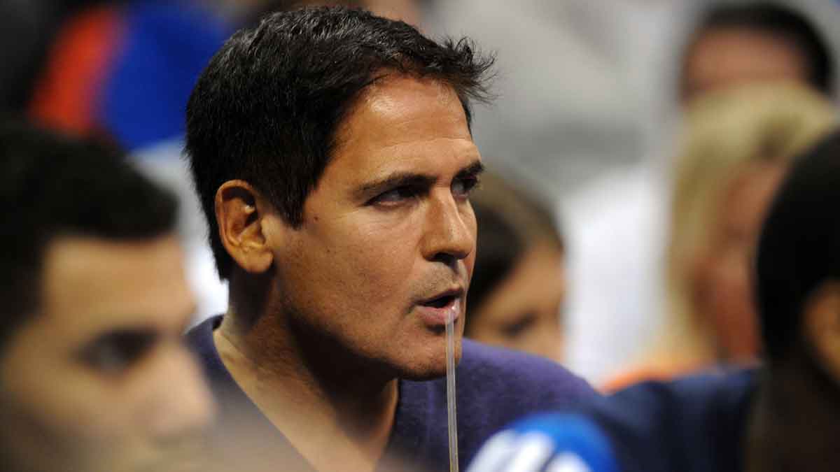 Dallas Mavericks owner and television entertainer Marc Cuban takes a drink while watching action against the Oklahoma City Thunder during the second quarter at Chesapeake Energy Arena.