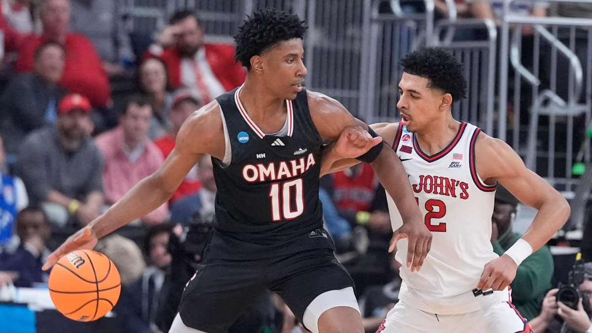 Omaha Mavericks forward Marquel Sutton (10) controls the ball against St. John's Red Storm guard RJ Luis Jr. (12) during the first half at Amica Mutual Pavilion.
