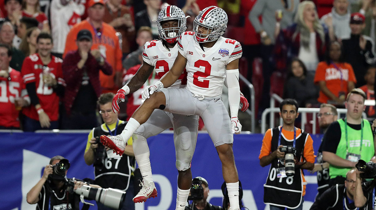 Ohio State Buckeyes safety Malik Hooker (24) celebrates with cornerback Marshon Lattimore (2) after intercepting pass against the Clemson Tigers during the first half of the the 2016 CFP semifinal at University of Phoenix Stadium.