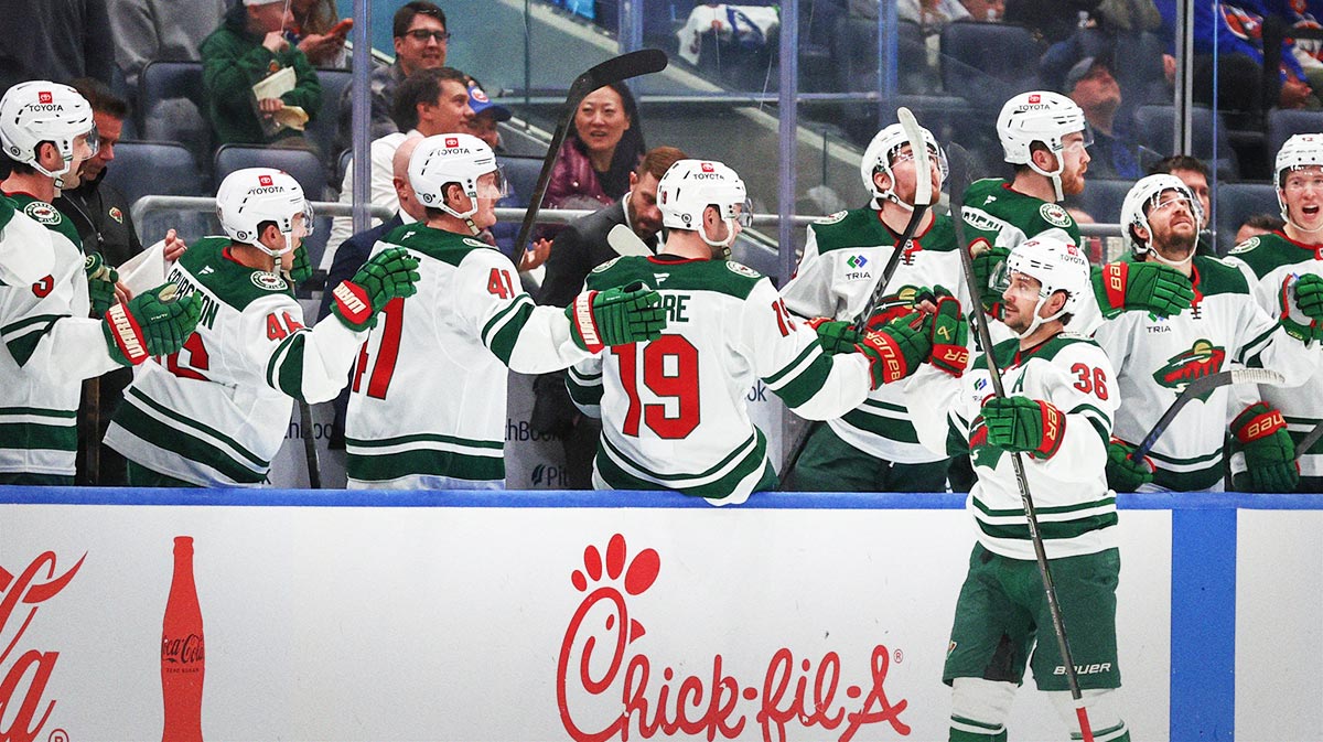 Minnesota Wild right wing Mats Zuccarello (36) celebrates with his teammates after scoring a goal in the second period against the New York Islanders at UBS Arena.