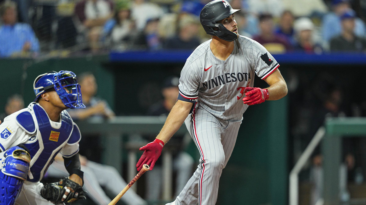 Minnesota Twins designated hitter Matt Wallner (38) hits a home run during the eighth inning against the Kansas City Royals at Kauffman Stadium.